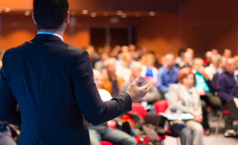 speaker in front of audience