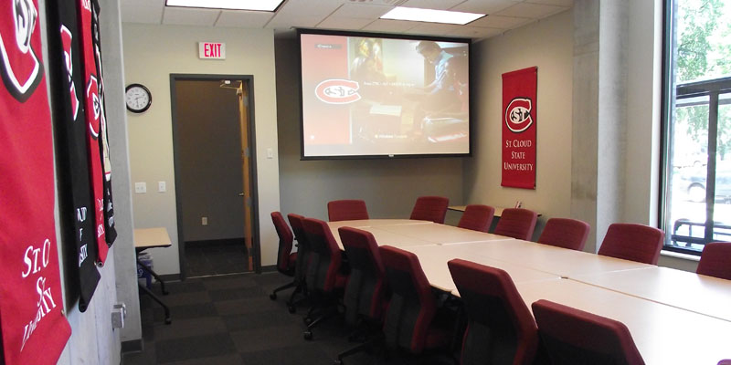 an interior view of the Husky Conference Room showing a table and chairs around the table